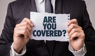 image of man holding are you covered sign