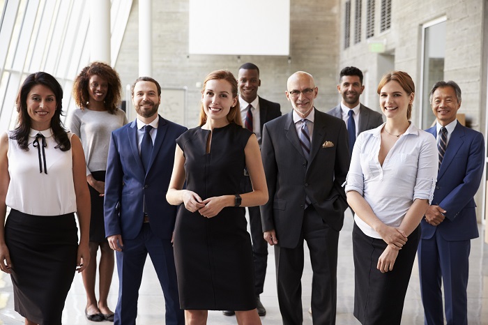 Business Executives standing group photo